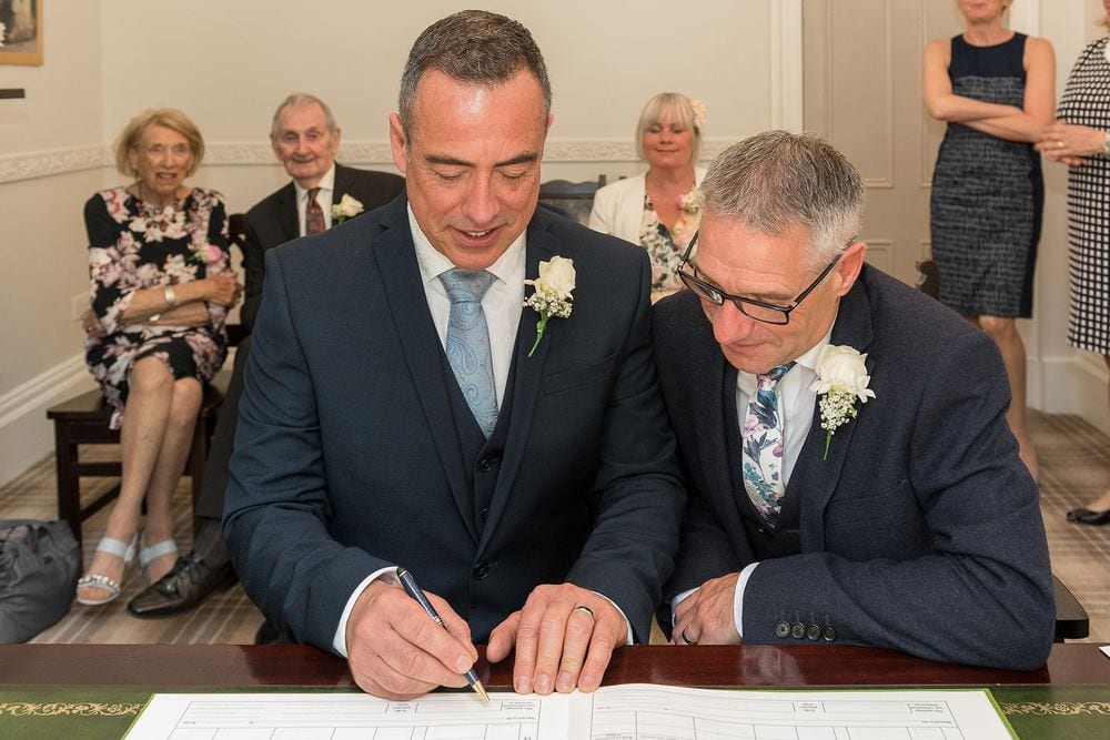 Roger & Mark sign the register at York Register Office.