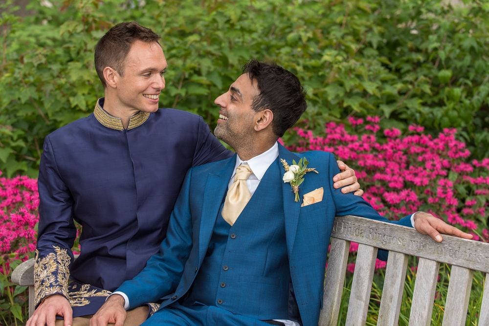 A quiet moment for grooms Ben & Chat after their wedding at The Grand Hotel, York.